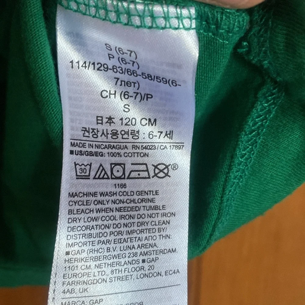 Long sleeve green Christmas shirts. Size S.